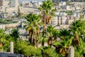 View of Arab homes in East Jerusalem through palm trees on the Davidson CenterÃ¢â¬â¢s southern steps, Jerusalem, Israel Royalty Free Stock Photo